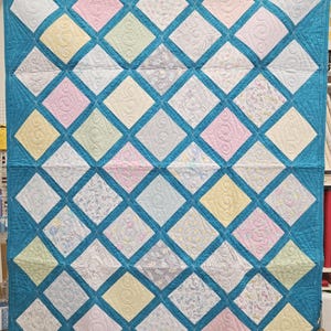 Blauer Baby Gitter Quilt