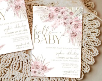 Puede incluir: Dos invitaciones de baby shower rosa y dorado con un diseño floral y el texto "hello baby". Las invitaciones incluyen el nombre "Sophie Aldridge" y la fecha "sábado 5 de mayo de 20XX".