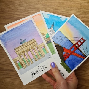 Postales polaroid de ciudades en acuarela