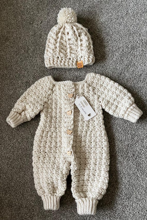 Gorgeous baby onsie, baby grow, pram suit, romper suit with hat.