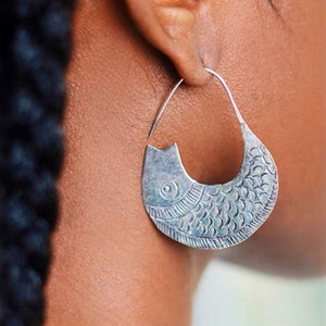 Silver-plated earrings in fish look
