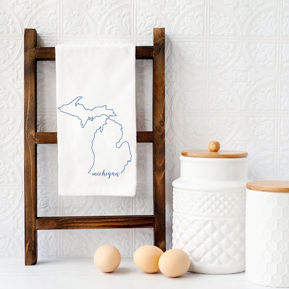White cotton tea towel printed with a Michigan design