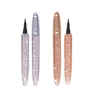 May include: Three liquid eyeliner pens with a diamond-encrusted design. The pens are silver, gold, and rose gold.