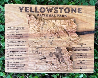 Yellowstone National Park topographic map, carved from a solid block of wood, with park details and notable features