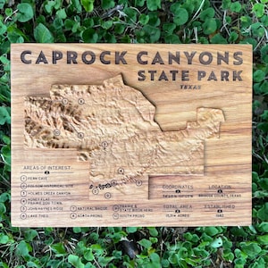 Caprock Canyons State Park topographic map, carved from a solid block of wood, with park details and notable features