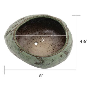 Glazed ceramic succulent pot in copper patina green color.  The unique uneven surface makes the pot look like a stone.  Perfect for succulents, cacti, or small house plants.  Drainage hole at the bottom.