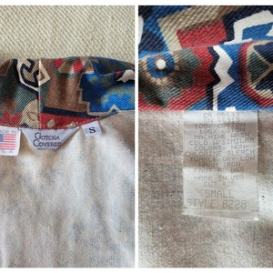 May include: A white cotton shirt with a colorful geometric pattern. The shirt has a tag that reads "Gotcha Covered" and "Made in USA". The tag also includes the size "S" and style number "6228".