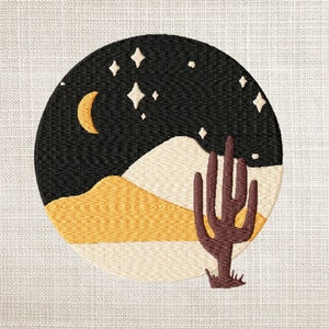 May include: Embroidered design of a desert landscape with a cactus, crescent moon, and stars against a black background. The desert is depicted in shades of yellow, beige, and white.