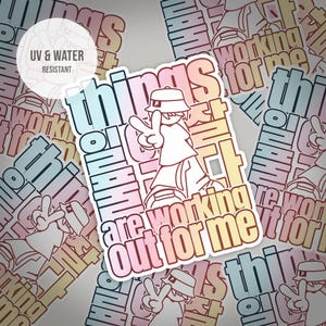 May include: A sticker with the text "things are working out for me" in a colorful gradient font. The sticker features a cartoon character giving a peace sign. The sticker is UV and water resistant.