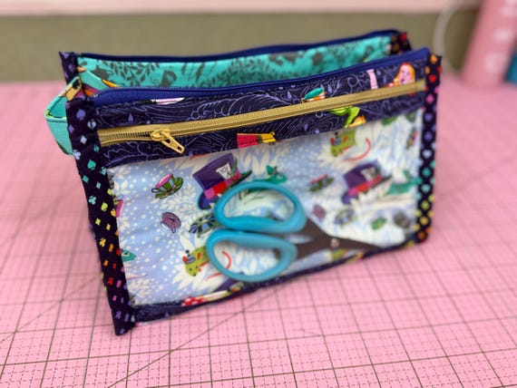 Inside Out Vinyl Pocket Pouch - Curiouser & Curiouser