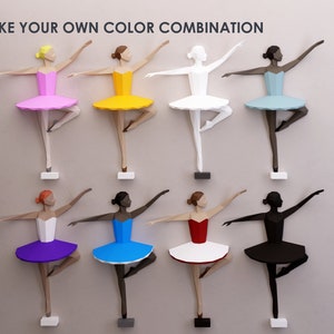 Personalized 3d wall ballerina paper decorations in different colors.