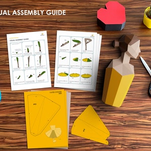Ballerina papercraft visual assembly guide.