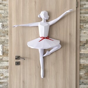 Ballerina 3d origami polygonal model hanging on doors.