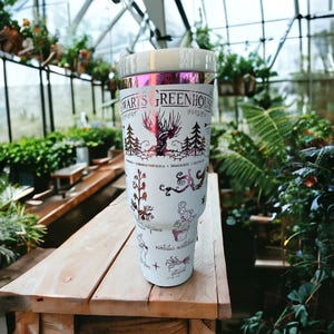 Herbology 40 oz tumbler in white with rainbow colorshift Chrome design