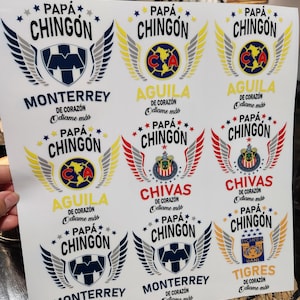 May include: Sheet of stickers featuring various soccer team logos, including Monterrey, Aguilas, Chivas, and Tigres. Each sticker has the text "Papá Chingón" and "De Corazón Odiame Más."