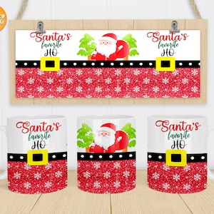 May include: Three white mugs with a red and white glitter background. The mugs have a black band with a yellow buckle and the text "Santa's favorite HO" in black. The mugs feature a cartoon image of Santa Claus in a red suit.