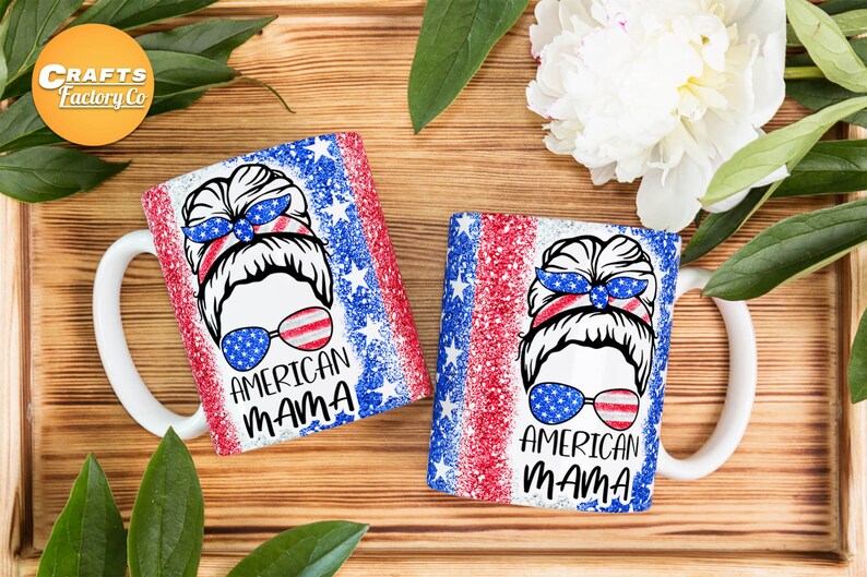 May include: Two white ceramic mugs with red, white, and blue glitter designs. The mugs feature a woman with a messy bun and sunglasses. The text "AMERICAN MAMA" is printed on each mug.