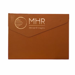 May include: A brown leather folder with a gold logo that says "MHR MinneHR Insights".
