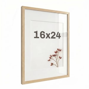 May include: A rectangular wooden picture frame with a white mount and a sprig of red berries. The frame has the text "16x24" in the centre. The frame is designed to hold a 40.6cm x 61cm image.