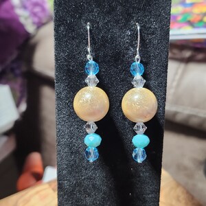 Dangle drop earrings with crystals