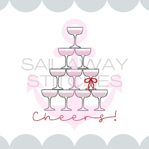 May include: An embroidered design featuring a pyramid of champagne glasses, with a red bow on one glass. The word "Cheers!" is written in red script below the glasses. The design is available in various sizes, from 3 to 6 inches.