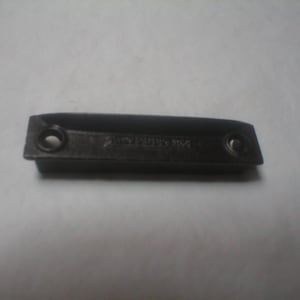 May include: A dark brown, rectangular metal object with rounded edges and two circular holes. The text "FAIRFIELD 801" is embossed on the surface. The object appears to be a hardware component, possibly a handle or a part of a larger mechanism.