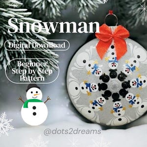 May include: A round silver Christmas ornament featuring a painted pattern of small snowmen arranged in a circular design. The ornament is topped with a bright orange ribbon bow. Text on the image reads Snowman, Digital Download, Beginner Step by Step Pattern, and @dots2dreams.