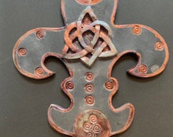 15" tall Fleur-De-Lis, Raku fired, with copper & silver colors, 3 pressed Celtic stamps, with larger center woven Celtic woven heart.