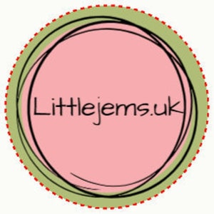 May include: A green and red circle with a pink circle inside. The text "Littlejems.uk" is written in black inside the pink circle.