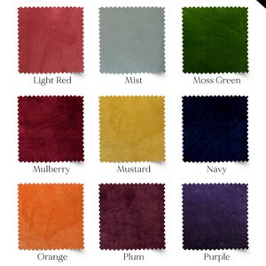 May include: Nine fabric swatches in various colors, including light red, mist, moss green, mulberry, mustard, navy, orange, plum, and purple. Each square has a scalloped edge and a label with the color name.