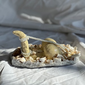 Decorative curvy female sculpture “Sakura” covered with pearls and handpicked shells with shibari - bondage  inspired