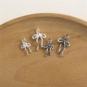 Pendentif à breloques ruban creux en argent sterling, bracelet noeud papillon, collier noeud papillon, boucle d'oreille noeud papillon, jolis bijoux noeud papillon, breloque noeud papillon délicat