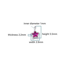 May include: A silver star charm with a pink gem in the center. The charm has an inner diameter of 1 mm, a width of 3.9 mm, a height of 5.5 mm, and a thickness of 2.2 mm.