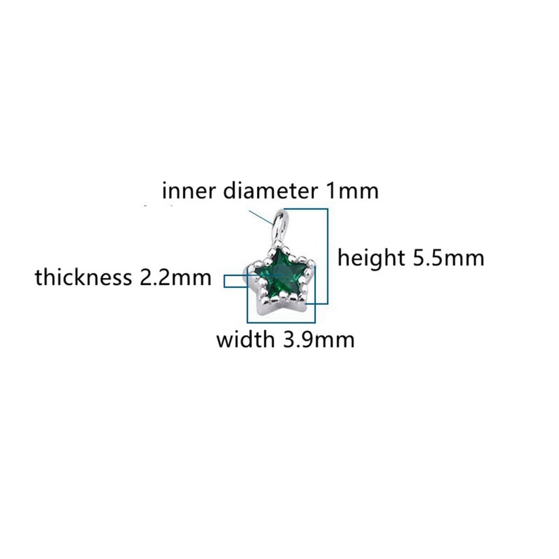 May include: A silver star charm with a green gemstone in the center. The charm is 5.5 mm high, 3.9 mm wide, and 2.2 mm thick. The inner diameter of the loop is 1 mm.