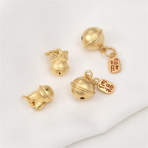 Pingente de sino de arco banhado a ouro, pulseira de sino de sino, colar de sino da sorte, brinco de sino de gato, joia de sino de natal, amuleto festivo