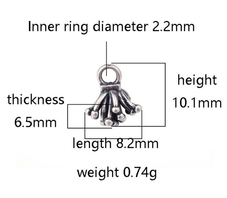 May include: Silver-toned metal charm with a tassel design. The charm measures 8.2 mm in length, 10.1 mm in height, and 6.5 mm in thickness. It weighs 0.74 grams.