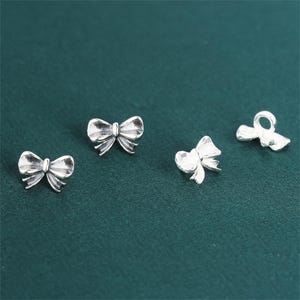 Knappar i sterlingsilver med rosett, rosettpärlor för smyckestillverkning, bandmönster, skaftknapp, knappspänne, syknapp