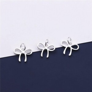Sterlingzilveren hanger met holle strik, strikarmband, lintketting, strikoorbel, schattige vlinderdassieraden, sierlijke strikbedel
