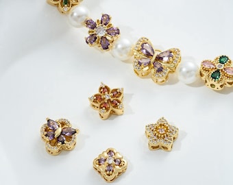 2 cuentas de flor de circonita cúbica chapadas en oro de 14 quilates, barra de tres agujeros, mariposa, trébol, lazo, espaciador de pulsera, floral y circonita.