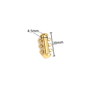 May include: A gold-toned metal multi-strand jewelry clasp featuring a cylindrical tube design with three small loops on each side for attaching chains. The clasp measures 20 mm in total length and has a diameter of 4.5 mm as indicated by text.