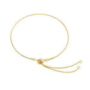 May include: A gold adjustable bracelet with a sliding bead and two chain ends.