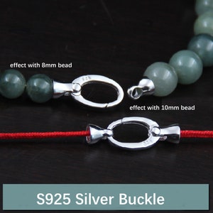 May include: Two silver S925 buckle clasps for jewellery making. The top clasp is shown with 8mm beads and the bottom clasp is shown with 10mm beads. The clasps are silver and have a polished finish.