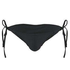 May include: A black bikini bottom with tie sides. The swimwear is made of a smooth, solid black fabric. The ties are thin and long, allowing for an adjustable fit. The design is simple and classic.