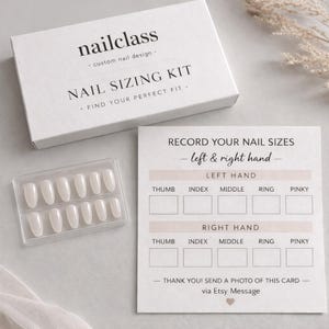 May include: A white nail sizing kit with the text "nailclass" and "NAIL SIZING KIT". Includes a clear plastic case of oval-shaped false nails and a card to record nail sizes for left and right hands.