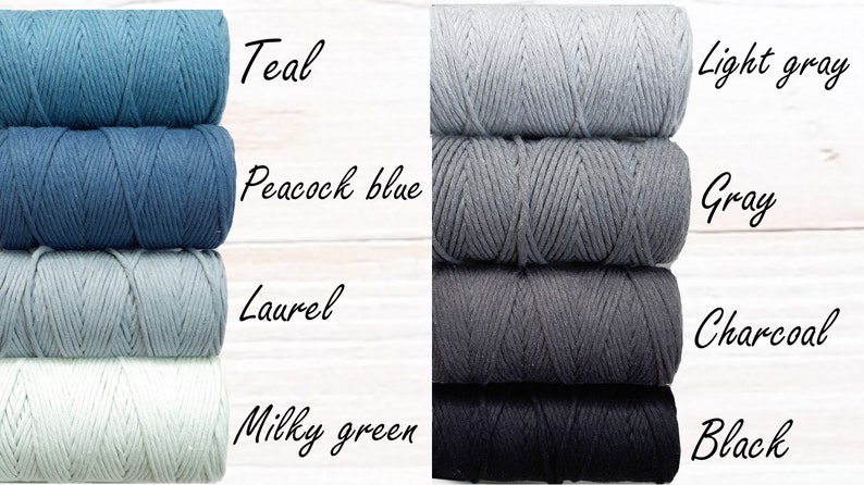 May include: Four spools of cotton cord in various shades of blue and grey. The colours are teal, peacock blue, laurel, milky green, light grey, grey, charcoal, and black.