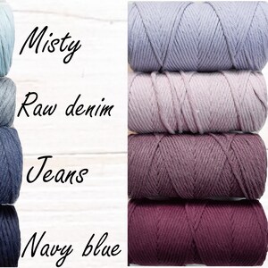 May include: Four spools of cotton cord in shades of blue, from light blue to dark blue, labelled "Misty", "Raw denim", "Jeans", and "Navy blue". Four spools of cotton cord in shades of purple, from light purple to dark purple, labelled "Lilac", "Dusty pink", "Alpine violet", and "Plum".