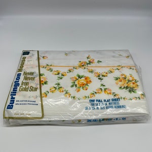 May include: A full flat sheet from Burlington House, featuring a floral pattern of yellow roses on a white background. The sheet is designed for a 54 x 75 inch mattress and measures 81 x 104 inches before hemming. Made of 50% cotton and 50% polyester.