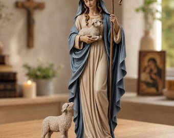 May include: A figurine of a woman wearing a long beige dress and a flowing blue head covering, holding a small lamb in her arms. She holds a tall wooden shepherd's crook in one hand. A second, smaller lamb stands on the surface beside her feet.