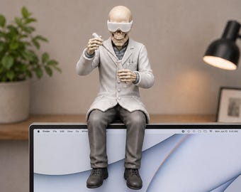 May include: A skeleton figurine wearing white safety goggles, a white lab coat, and gray trousers. The figure is seated, holding a clear pipette and a test tube. The skeleton has a neutral expression and is positioned on the top edge of a computer monitor.