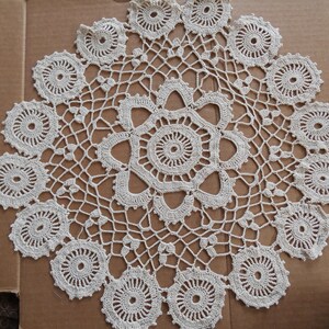 cream color lace doily